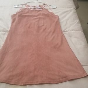 A pink sleeveless dress